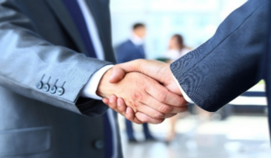 Men shaking hands in suit